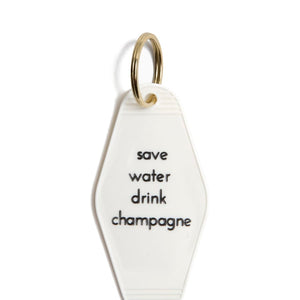 Save Water Drink Champagne Motel Key Tag